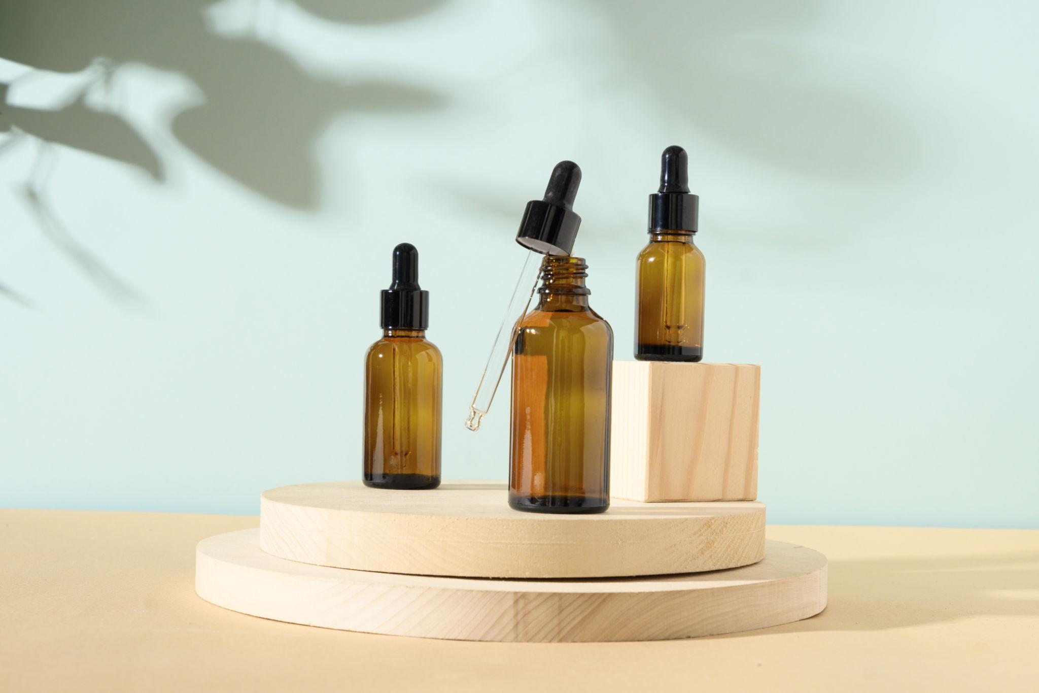 A product bottle styled on a neutral editorial still-life set.